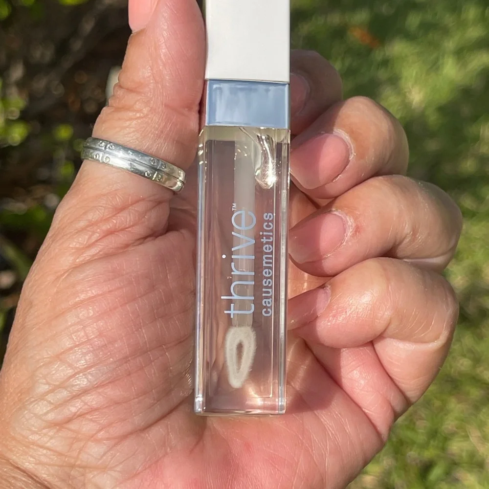 THRIVE CAUSEMETICS Pout Hero Clear Lip Gloss Balm In Vanilla Swirl